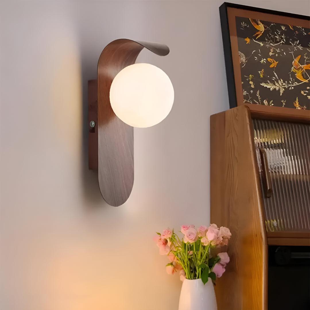 Wall Light With Curved Design And Glass Globe